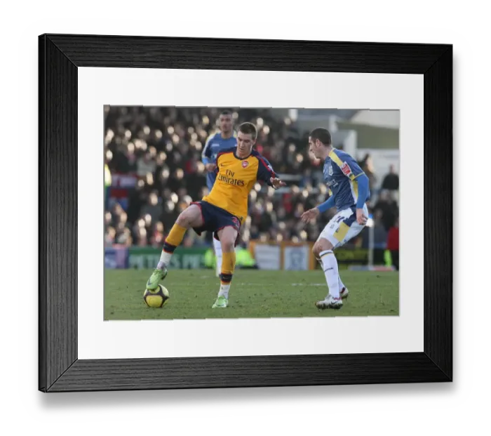 Framed Print : Nicklas Bendtner (Arsenal) Mark Kennedy (Cardiff) Framed Print : Nicklas Bendtner (Arsenal) Mark Kennedy (Cardiff)