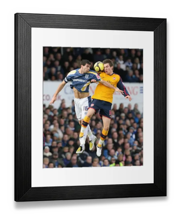 Framed Print : Aaron Ramsey (Arsenal) Joe Ledley (Cardiff) Framed Print : Aaron Ramsey (Arsenal) Joe Ledley (Cardiff)