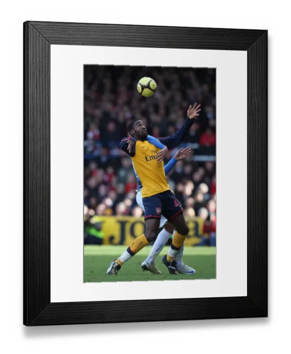 Framed Print : Johan Djourou (Arsenal) Jay Bothroyd (Cardiff) Framed Print : Johan Djourou (Arsenal) Jay Bothroyd (Cardiff)