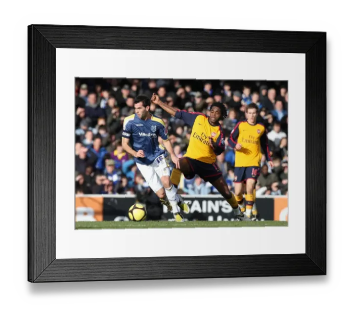 Framed Print : Alex Song (Arsenal) Joe Ledley (Cardiff) Framed Print : Alex Song (Arsenal) Joe Ledley (Cardiff)