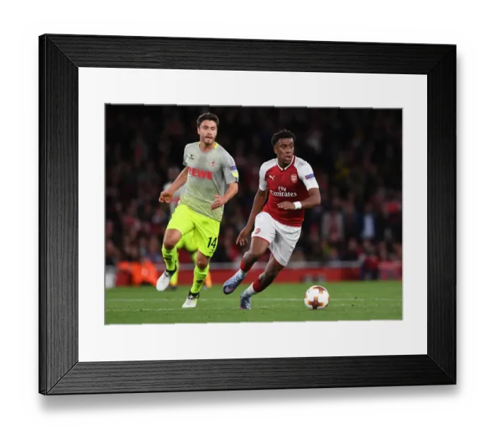 Framed Print : Clash of Stars: Alex Iwobi vs. Jonas Hector in Europa League Showdown