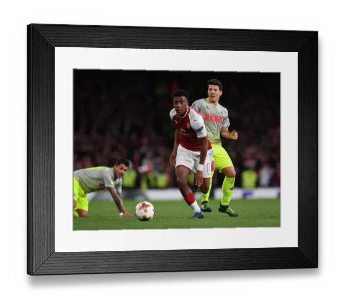 Framed Print : Arsenal's Alex Iwobi Clashes with FC Köln's Leonardo Bittencourt and Milos Jojic in Europa League Battle