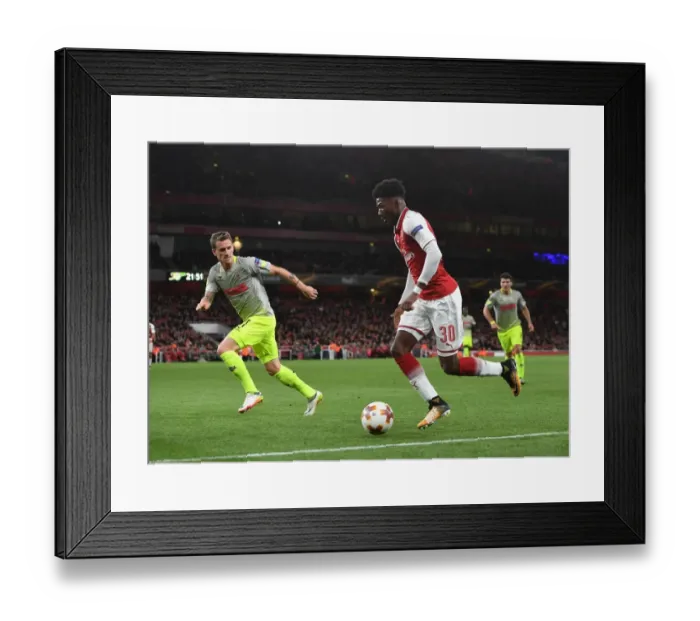 Framed Print : Arsenal's Ainsley Maitland-Niles Clashes with Simon Zoller of FC Köln in Europa League Action Framed Print : Arsenal's Ainsley Maitland-Niles Clashes with Simon Zoller of FC Köln in Europa League Action