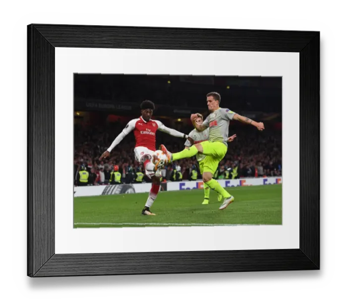 Framed Print : Arsenal vs. 1. FC Koeln: Ainsley Maitland-Niles vs. Simon Zoller in Europa League Clash Framed Print : Arsenal vs. 1. FC Koeln: Ainsley Maitland-Niles vs. Simon Zoller in Europa League Clash