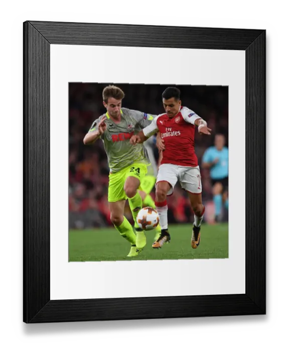 Framed Print : Clash of Stars: Sanchez vs. Klunter in Arsenal's Europa League Battle against 1. FC Koeln Framed Print : Clash of Stars: Sanchez vs. Klunter in Arsenal's Europa League Battle against 1. FC Koeln