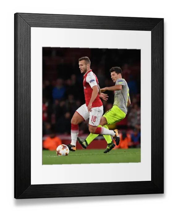 Framed Print : Arsenal's Jack Wilshere Clashes with FC Köln's Milos Jojic in Europa League Showdown