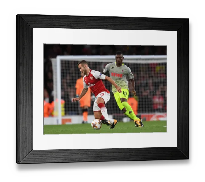 Framed Print : Arsenal's Jack Wilshere Clashes with Jhon Cordoba in Europa League Showdown