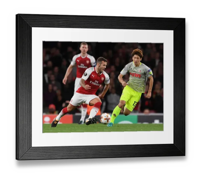 Framed Print : Clash of the Midfield: Jack Wilshere vs. Yuya Osako - Arsenal's Europa League Showdown Framed Print : Clash of the Midfield: Jack Wilshere vs. Yuya Osako - Arsenal's Europa League Showdown