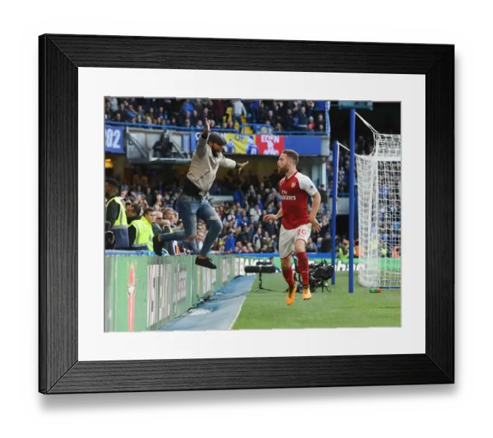 Framed Print : Mustafi's Disallowed Goal: Ardent Arsenal Fan Invades Pitch in Chelsea Clash (2017-18) Framed Print : Mustafi's Disallowed Goal: Ardent Arsenal Fan Invades Pitch in Chelsea Clash (2017-18)