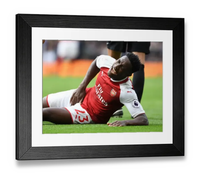 Framed Print : Danny Welbeck Injured: Premier League Showdown Between Chelsea and Arsenal, 2017-18 Framed Print : Danny Welbeck Injured: Premier League Showdown Between Chelsea and Arsenal, 2017-18