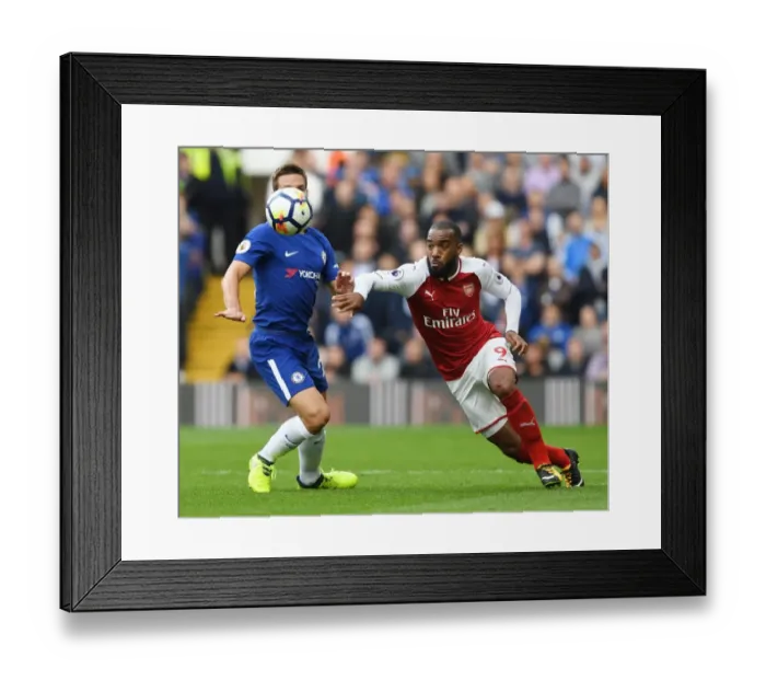 Framed Print : Clash of Titans: Lacazette vs Azpilicueta - Premier League Battle Framed Print : Clash of Titans: Lacazette vs Azpilicueta - Premier League Battle