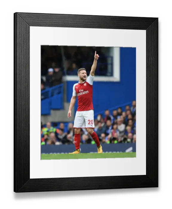 Framed Print : Shkodran Mustafi's Unwavering Focus Amidst the Intense Chelsea vs Arsenal Rivalry (2017-18)