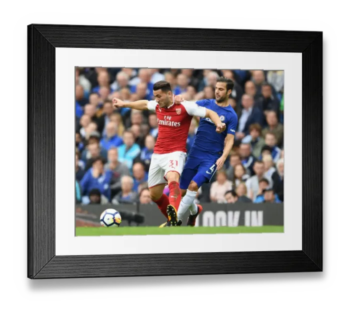 Framed Print : Sead Kolasinac vs. Cesc Fabregas: Battle at Stamford Bridge - Premier League 2017-18 Framed Print : Sead Kolasinac vs. Cesc Fabregas: Battle at Stamford Bridge - Premier League 2017-18