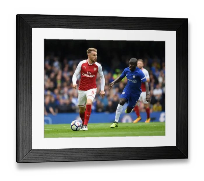 Framed Print : Ramsey Outmaneuvers Kante: Intense Battle between Arsenal's Aaron Ramsey and Chelsea's N'Golo Kante during the Premier League Match Framed Print : Ramsey Outmaneuvers Kante: Intense Battle between Arsenal's Aaron Ramsey and Chelsea's N'Golo Kante during the Premier League Match