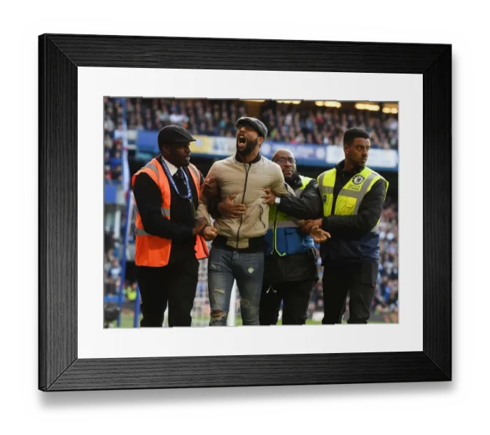 Framed Print : Arsenal Fan Removed from Chelsea vs. Arsenal Match, Premier League 2017-18