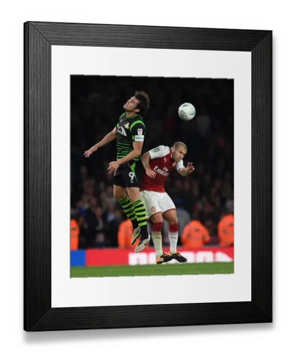 Framed Print : Jack Wilshere vs John Marquis: Arsenal vs Doncaster Rovers in Carabao Cup Clash