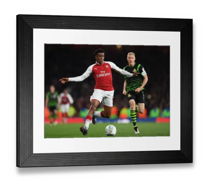 Framed Print : Arsenal's Alex Iwobi Faces Off Against Doncaster's Craig Alcock in Carabao Cup Clash Framed Print : Arsenal's Alex Iwobi Faces Off Against Doncaster's Craig Alcock in Carabao Cup Clash