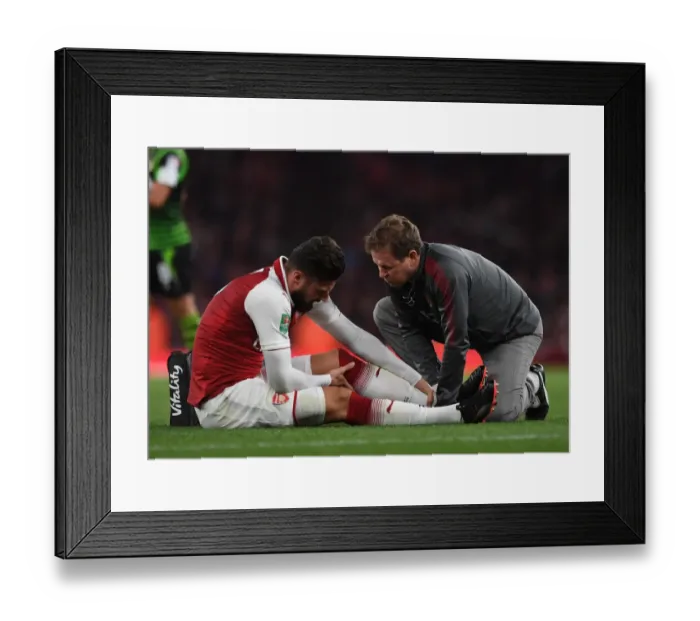Framed Print : Arsenal physio Colin Lewin treats Olivier Giroud (Arsenal). Arsenal 1: 0 Doncaster Framed Print : Arsenal physio Colin Lewin treats Olivier Giroud (Arsenal). Arsenal 1: 0 Doncaster