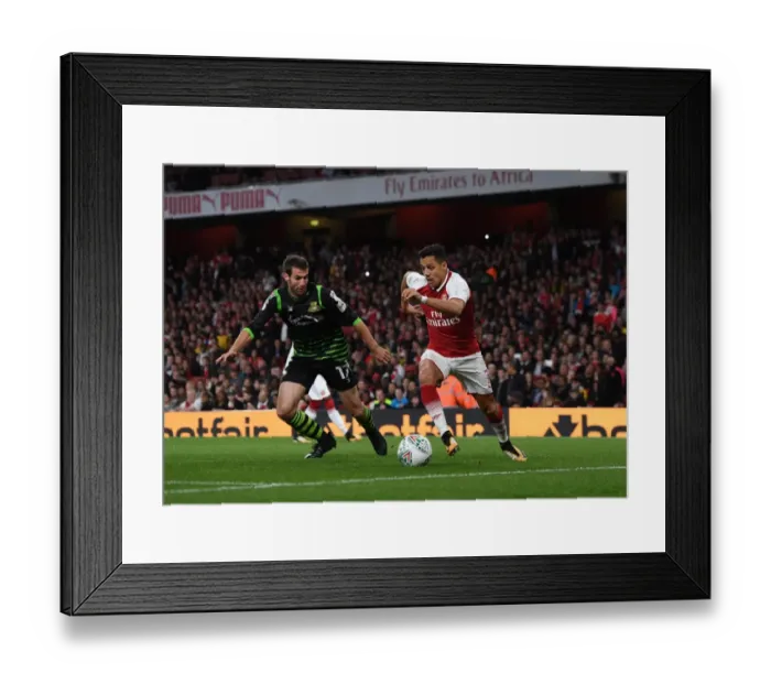 Framed Print : Alexis Sanchez (Arsenal) Matty Blair (Doncaster). Arsenal 1: 0 Doncaster. The Carabao Cup Framed Print : Alexis Sanchez (Arsenal) Matty Blair (Doncaster). Arsenal 1: 0 Doncaster. The Carabao Cup