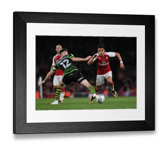 Framed Print : Arsenal's Alexis Sanchez vs. Ben Whiteman: A Carabao Cup Battle at Emirates Stadium Framed Print : Arsenal's Alexis Sanchez vs. Ben Whiteman: A Carabao Cup Battle at Emirates Stadium