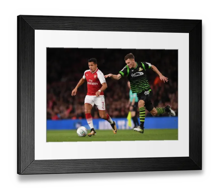 Framed Print : Arsenal's Alexis Sanchez Faces Off Against Joe Wright in Carabao Cup Battle