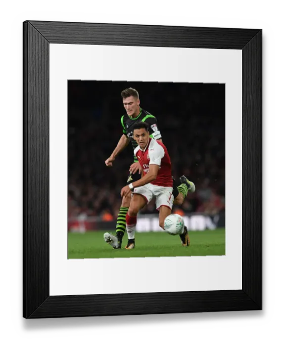 Framed Print : Alexis Sanchez (Arsenal) Joe Wright (Doncaster). Arsenal 1: 0 Doncaster. The Carabao Cup Framed Print : Alexis Sanchez (Arsenal) Joe Wright (Doncaster). Arsenal 1: 0 Doncaster. The Carabao Cup
