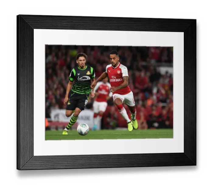 Framed Print : Theo Walcott vs Niall Mason: Arsenal vs Doncaster Rovers in Carabao Cup Clash Framed Print : Theo Walcott vs Niall Mason: Arsenal vs Doncaster Rovers in Carabao Cup Clash