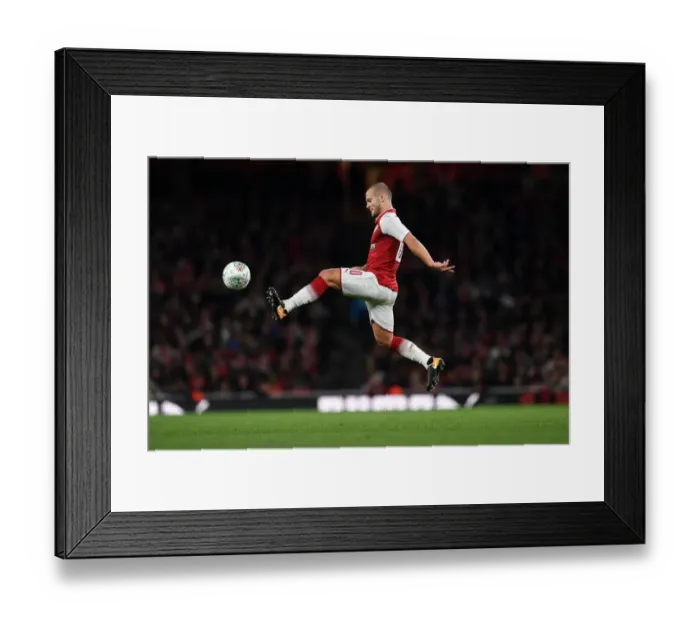 Framed Print : Jack Wilshere: Arsenal's Midfield Maestro Dazzles in Carabao Cup Victory over Doncaster Rovers