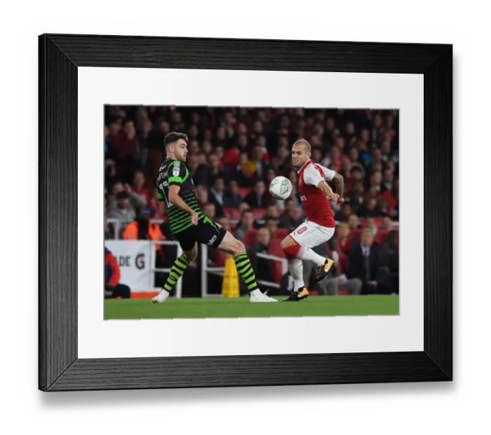 Framed Print : Jack Wilshere (Arsenal) Ben Whiteman (Doncaster). Arsenal 1: 0 Doncaster. The Carabao Cup Framed Print : Jack Wilshere (Arsenal) Ben Whiteman (Doncaster). Arsenal 1: 0 Doncaster. The Carabao Cup