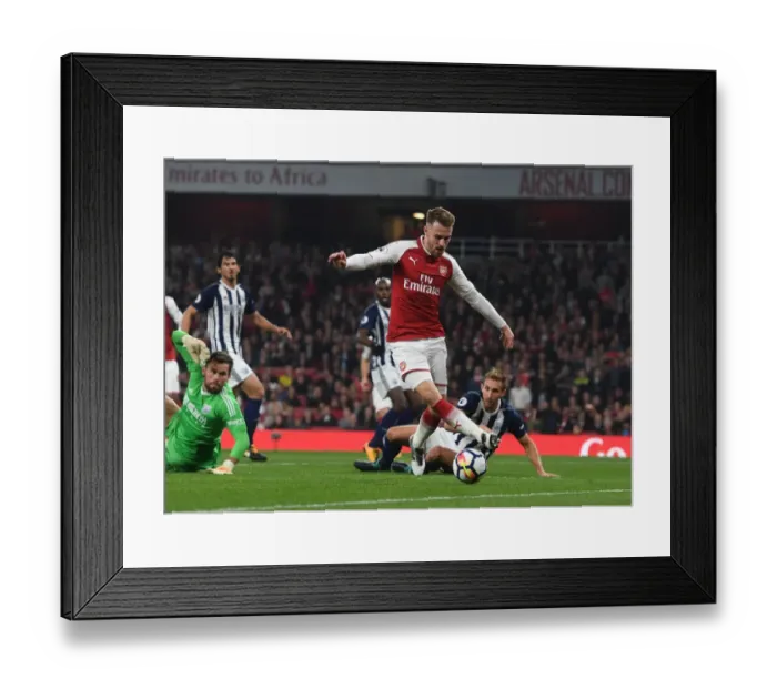 Framed Print : Arsenal's Aaron Ramsey Faces Off Against West Bromwich Albion's Ben Foster Framed Print : Arsenal's Aaron Ramsey Faces Off Against West Bromwich Albion's Ben Foster