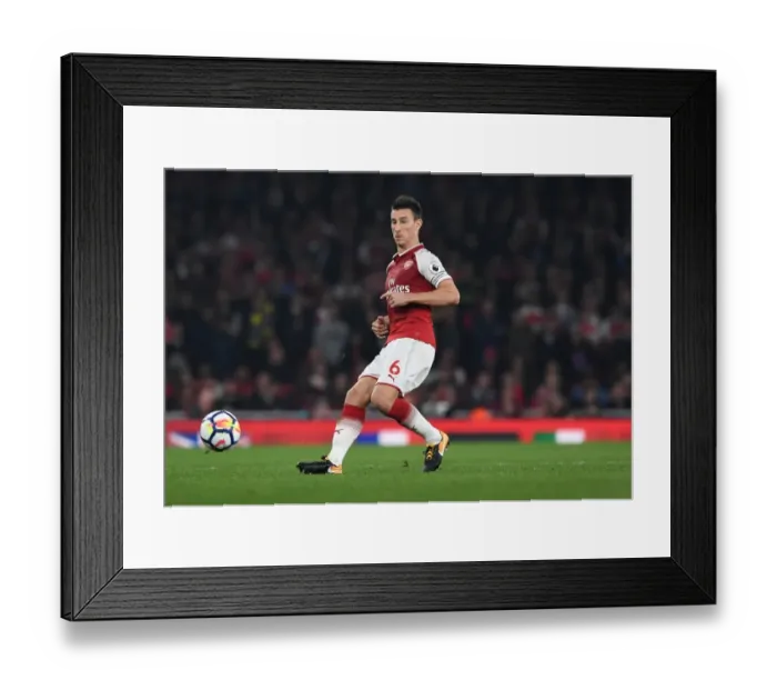Framed Print : Arsenal's Laurent Koscielny in Action Against West Bromwich Albion, Premier League 2017-18