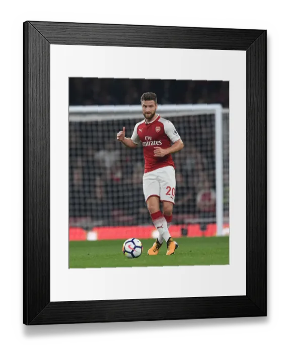 Framed Print : Shkodran Mustafi Focuses in Arsenal's Battle Against West Bromwich Albion (2017-18) Framed Print : Shkodran Mustafi Focuses in Arsenal's Battle Against West Bromwich Albion (2017-18)