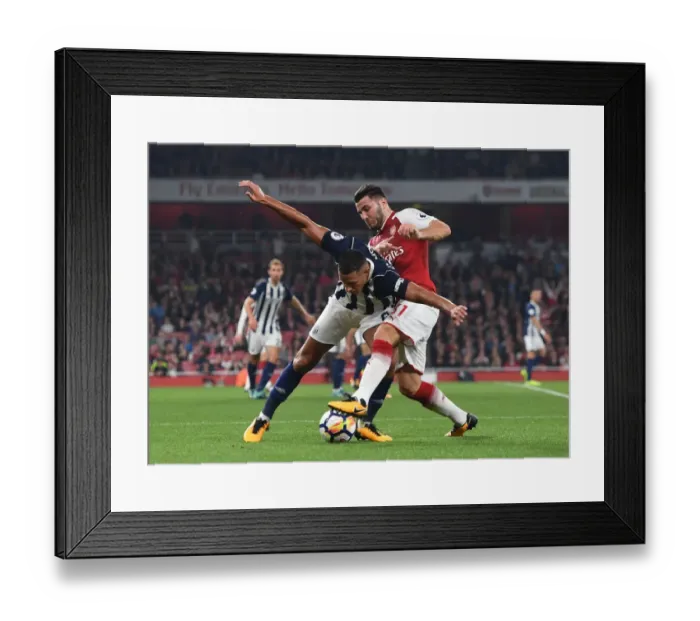 Framed Print : Sead Kolasinac vs Jake Livermore: Intense Tackle in Arsenal vs West Bromwich Albion Premier League Clash Framed Print : Sead Kolasinac vs Jake Livermore: Intense Tackle in Arsenal vs West Bromwich Albion Premier League Clash