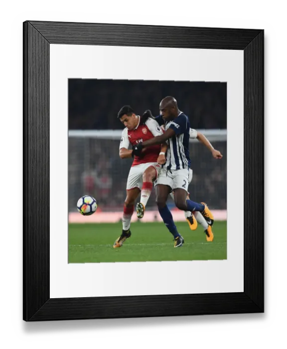 Framed Print : Clash at Emirates: Sanchez vs. Nyom in Arsenal's Battle Against West Brom Framed Print : Clash at Emirates: Sanchez vs. Nyom in Arsenal's Battle Against West Brom