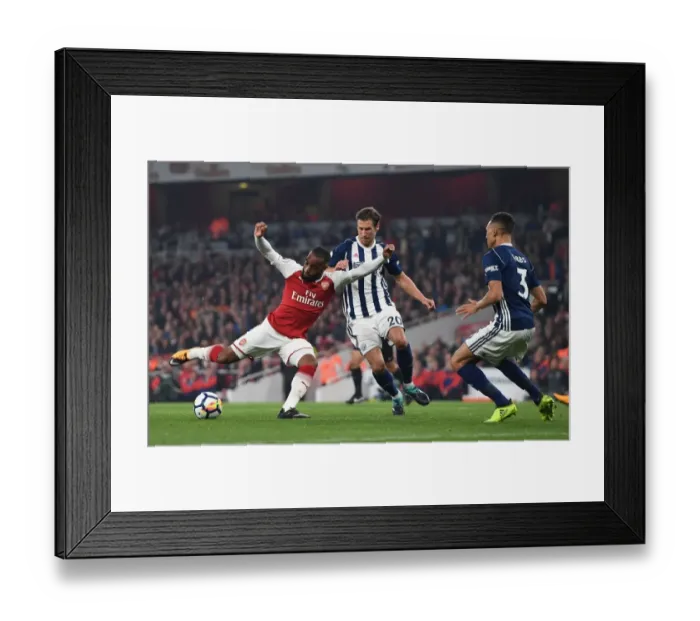 Framed Print : Arsenal's Lacazette Faces Off Against West Brom's Krychowiak in Premier League Showdown
