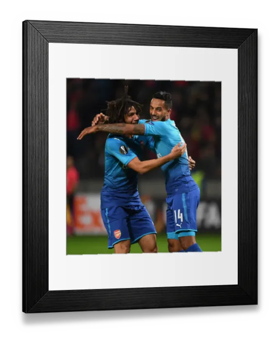 Framed Print : Theo Walcott and Mohamed Elneny Celebrate Arsenal's Goals Against BATE Borisov in Europa League Framed Print : Theo Walcott and Mohamed Elneny Celebrate Arsenal's Goals Against BATE Borisov in Europa League