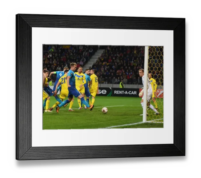 Framed Print : Rob Holding Scores Third for Arsenal against BATE Borisov in Europa League Framed Print : Rob Holding Scores Third for Arsenal against BATE Borisov in Europa League