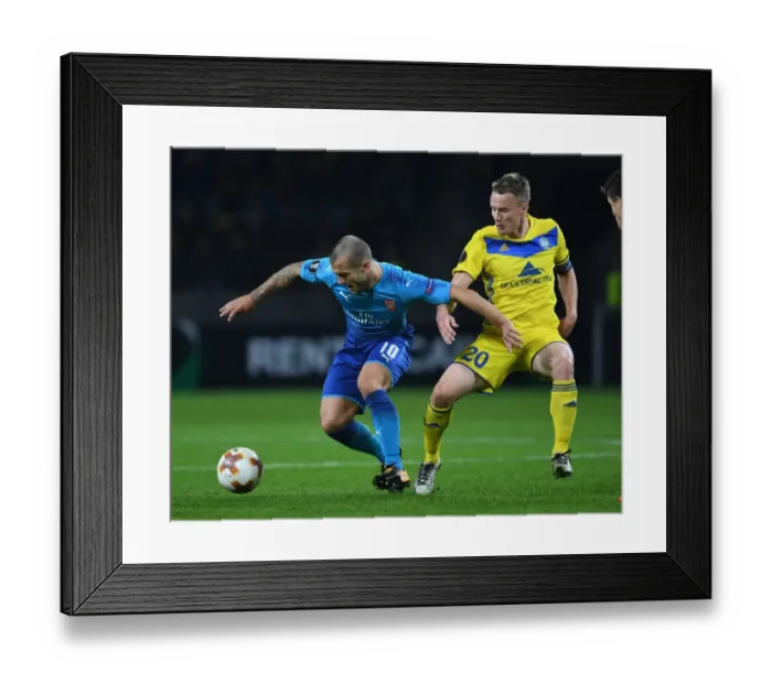 Framed Print : Jack Wilshere vs Vitali Rodionov: Europa League Showdown