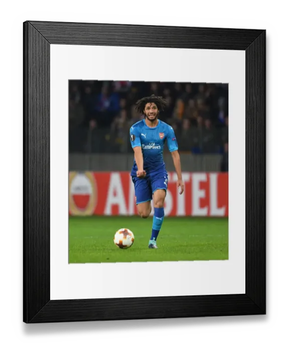 Framed Print : Mohamed Elneny: Arsenal's Midfield Maestro Dazzles in Europa League Showdown against BATE Borisov Framed Print : Mohamed Elneny: Arsenal's Midfield Maestro Dazzles in Europa League Showdown against BATE Borisov