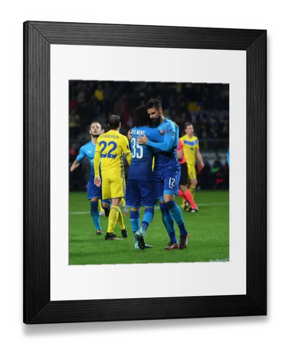 Framed Print : Olivier Giroud and Mohamed Elneny Celebrate Arsenal's Europa League Goals Against BATE Borisov Framed Print : Olivier Giroud and Mohamed Elneny Celebrate Arsenal's Europa League Goals Against BATE Borisov