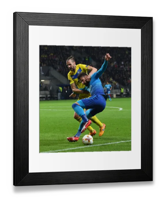 Framed Print : Clash of Titans: Nemanja Milunovic vs. Olivier Giroud in FC BATE Borisov vs. Arsenal UEFA Europa League Showdown