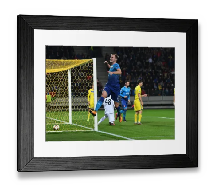 Framed Print : Rob Holding Scores as Arsenal Thrash BATE Borisov in Europa League Framed Print : Rob Holding Scores as Arsenal Thrash BATE Borisov in Europa League