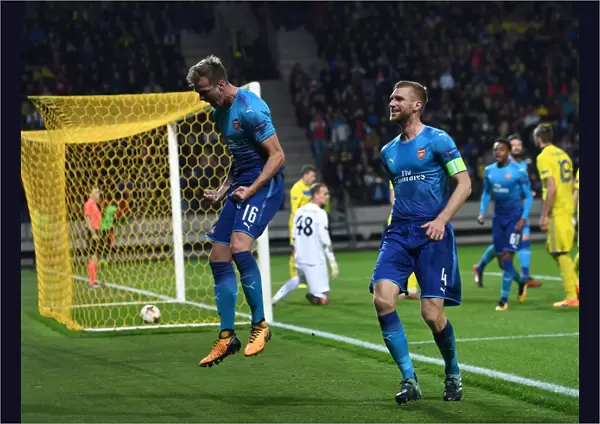 Arsenal's Rob Holding and Per Mertesacker Celebrate Goal Against BATE Borisov in Europa League