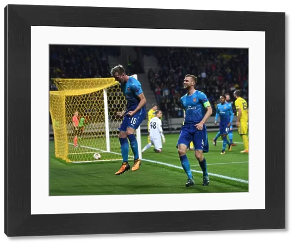 Arsenal's Rob Holding and Per Mertesacker Celebrate Goal Against BATE Borisov in Europa League