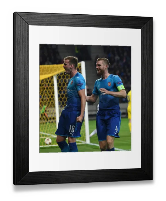 Framed Print : Arsenal's Rob Holding and Per Mertesacker Celebrate Goals in UEFA Europa League Match Framed Print : Arsenal's Rob Holding and Per Mertesacker Celebrate Goals in UEFA Europa League Match