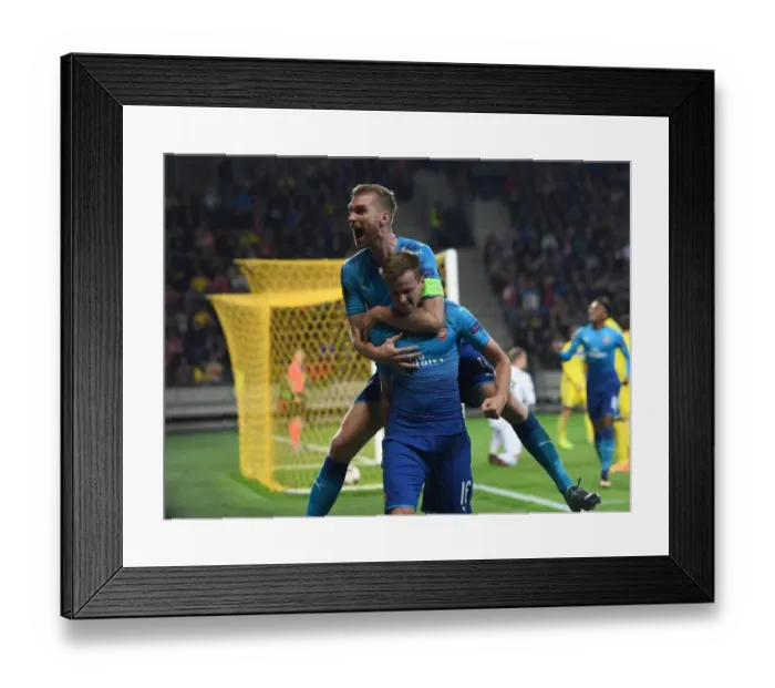 Framed Print : Arsenal's Rob Holding and Per Mertesacker Celebrate Goals in Europa League Match Framed Print : Arsenal's Rob Holding and Per Mertesacker Celebrate Goals in Europa League Match