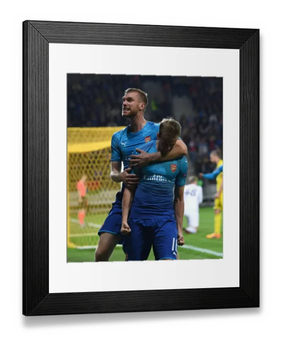 Framed Print : Arsenal's Holding and Mertesacker Celebrate Goals Against FC BATE Borisov in Europa League Framed Print : Arsenal's Holding and Mertesacker Celebrate Goals Against FC BATE Borisov in Europa League