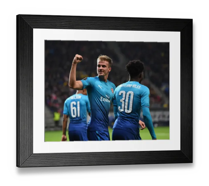 Framed Print : Rob Holding Scores as Arsenal Thrash BATE Borisov in Europa League Framed Print : Rob Holding Scores as Arsenal Thrash BATE Borisov in Europa League
