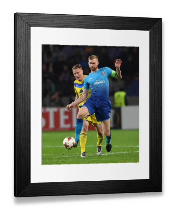 Framed Print : Per Mertesacker vs. Vitali Rodionov: A Europa League Showdown at Borisov-Arena