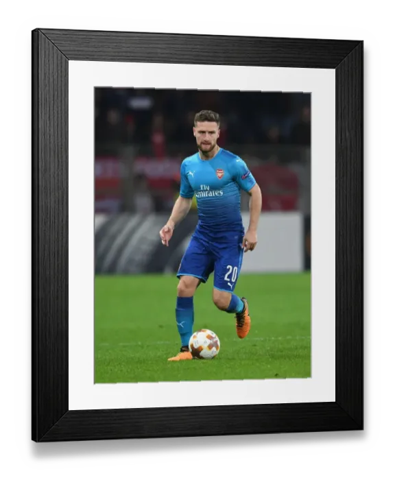 Framed Print : Shkodran Mustafi: Arsenal's Defender in Action against BATE Borisov, UEFA Europa League 2017-18 Framed Print : Shkodran Mustafi: Arsenal's Defender in Action against BATE Borisov, UEFA Europa League 2017-18